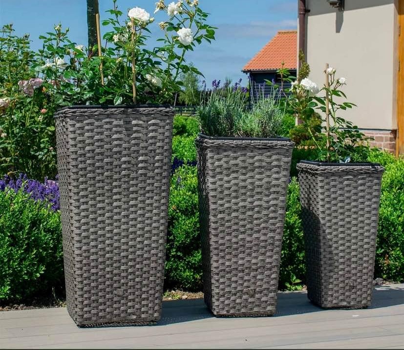 Upcycled Outdoor Furniture Ideas - wicker wash baskets upcycled into a planter