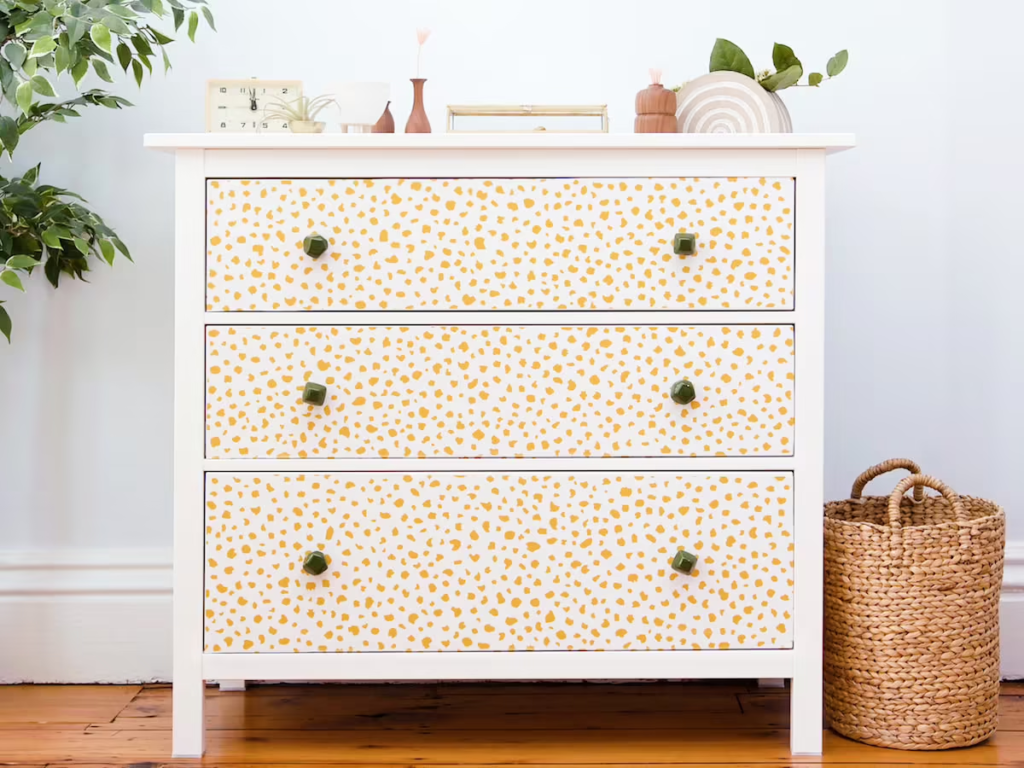 20 Upcycled and Repurposed Bedroom Furniture Ideas - Wallpapered Dresser Upgrade